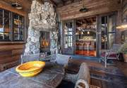 Patio with stone fireplace | Lahontan Luxury Home