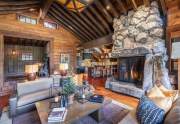 Great room with dramatic stone fireplace | Lahontan Luxury Home